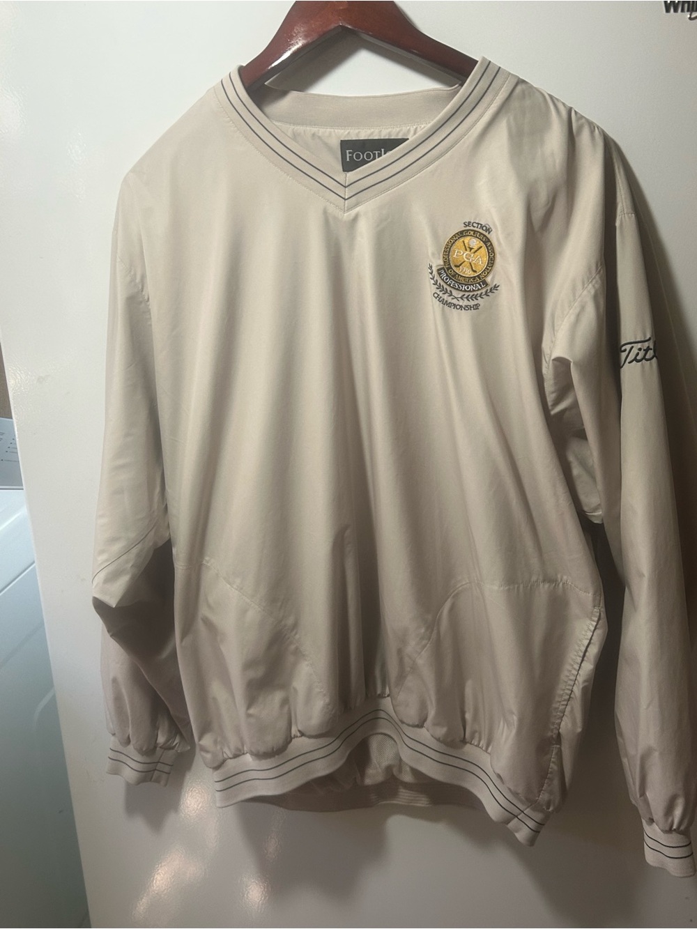 FootJoy Beige V-Neck Windbreaker with Crest with pga logo